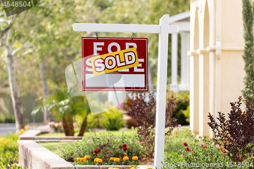 Image of Sold Home For Sale Real Estate Sign in Front of New House