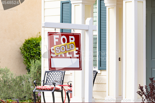 Image of Sold Home For Sale Real Estate Sign in Front of New House