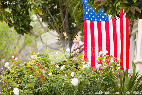 Image of Front Porches with American Flags.