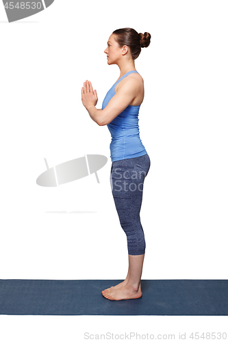 Image of Woman doing Hatha Yoga asana Tadasana 