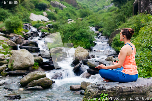 Image of Woman in Padmasana outdoors