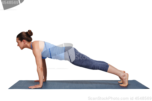 Image of Woman doing yoga Surya Namaskar Sun Salutation asana Utthita cha