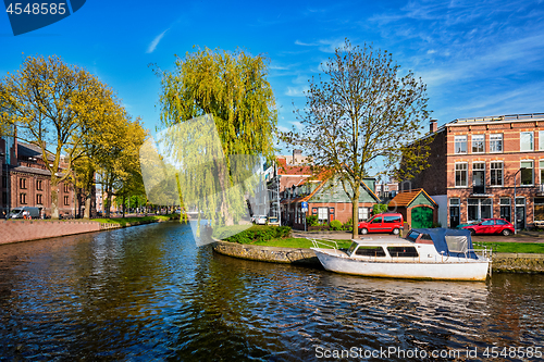 Image of Boats, houses and canal. Harlem, Netherlands