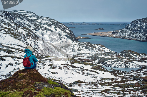 Image of Woman tourist on Lofoten islands, Norway