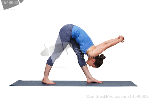 Image of Woman doing Ashtanga Vinyasa yoga asana Parsvottanasana