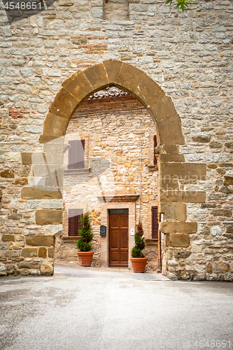 Image of old gate stone wall Italy
