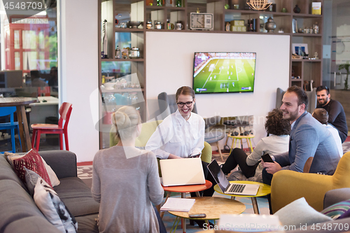 Image of Startup Business Team At A Meeting at modern office building