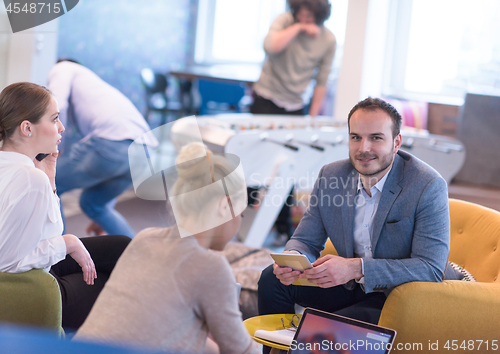 Image of Startup Business Team At A Meeting at modern office building