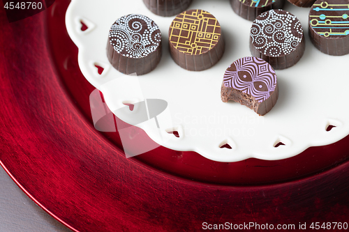 Image of Artisan Fine Chocolate Candy On Serving Dish with Heart Design