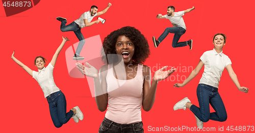 Image of Beautiful woman looking suprised and running and jumping man and girl