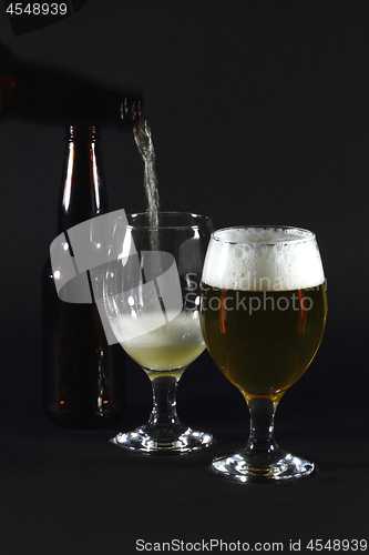 Image of Pouring beer in glass. 