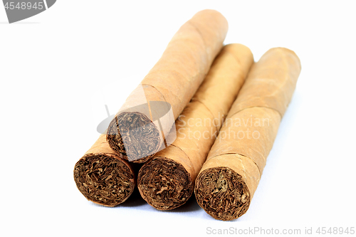 Image of Pile cigars. 