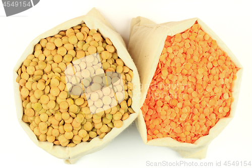 Image of Seeds red and green Lentils in fabric bags.