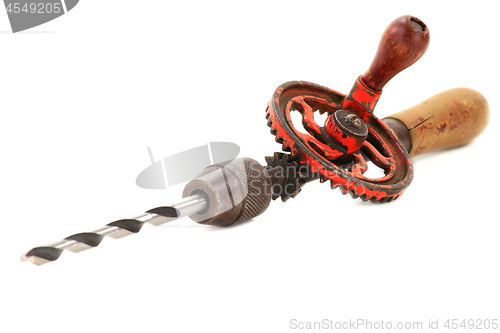 Image of Antique Hand Drill - close-up photo. 