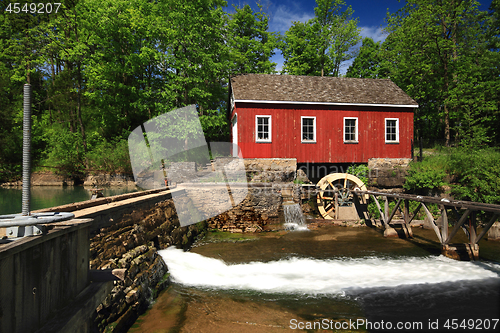 Image of Historical building of Old water sawmill and small dam.