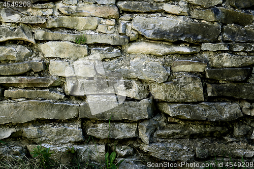 Image of Wall built from stone plates in 1875 