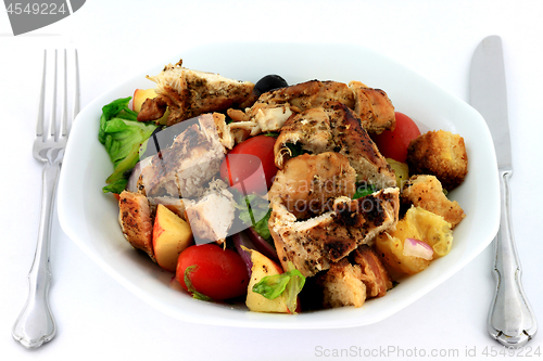 Image of Chicken Salad in porcelain dish.  