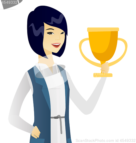 Image of Young asian business woman holding a trophy.