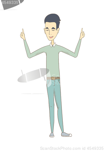 Image of Young asian man standing with raised arms.