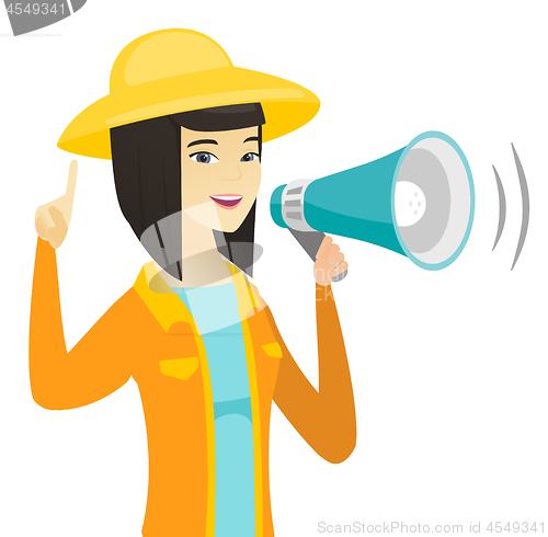 Image of Young asian farmer farmer talking into loudspeaker