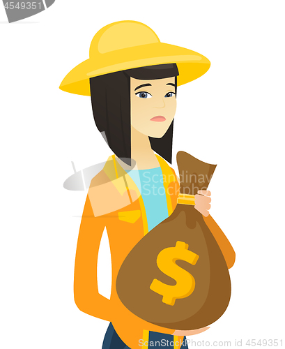 Image of Upset young asian farmer holding a money bag.