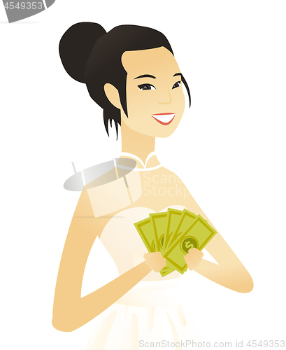 Image of Young asian fiancee holding money.