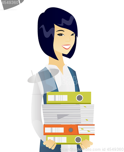 Image of Young asian business woman holding pile of folders