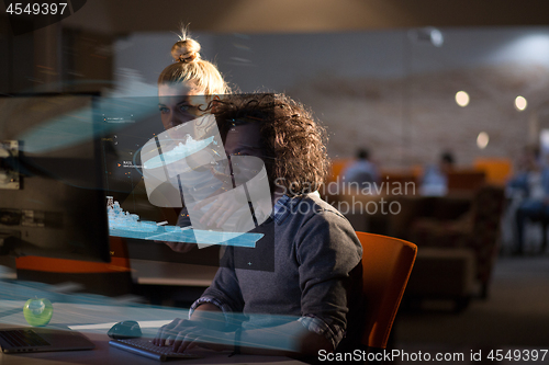 Image of young designers in the night office