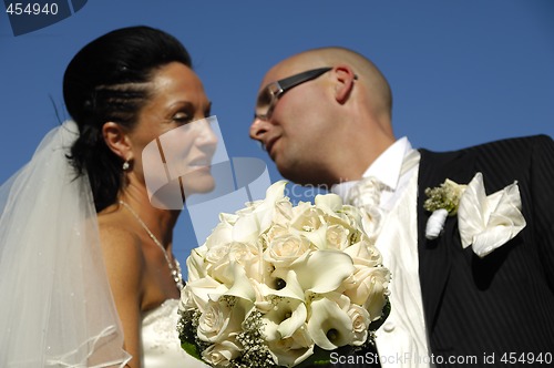 Image of Wedding flowers and couple