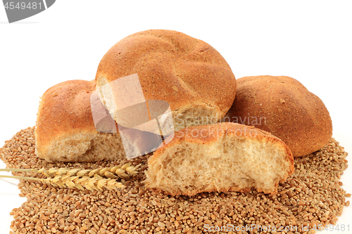 Image of Raw Wheat Kernels, Wheatears and Whole Wheat Buns  