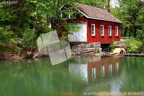 Image of Historical Building of Sawmill and Dam. 