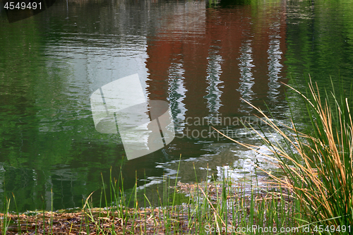 Image of Reflection in the water of very old Building. 