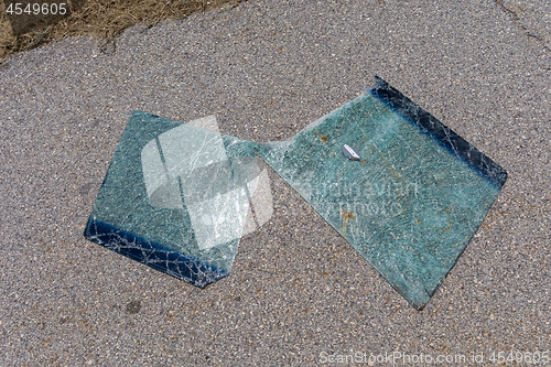 Image of Two Broken Car Glass