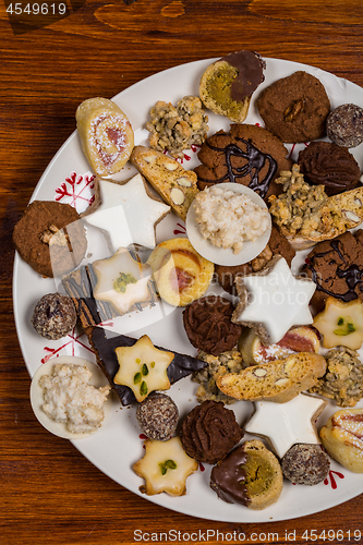 Image of Assorted Christmas cookies on wooden table