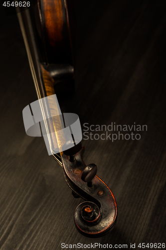 Image of Close view of old violin and strings in vintage style