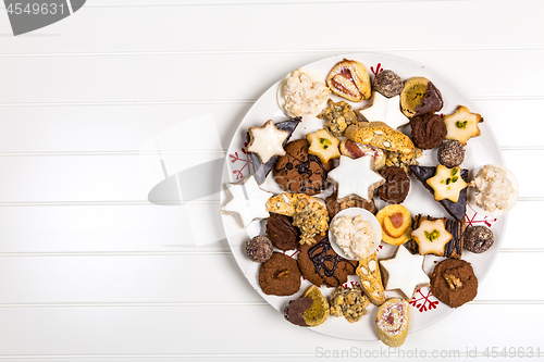 Image of Assorted Christmas cookies on wooden table