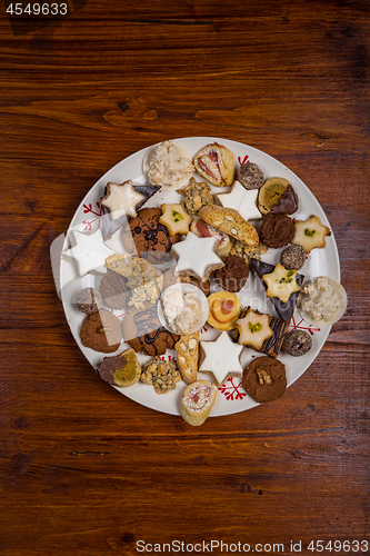 Image of Assorted Christmas cookies on wooden table