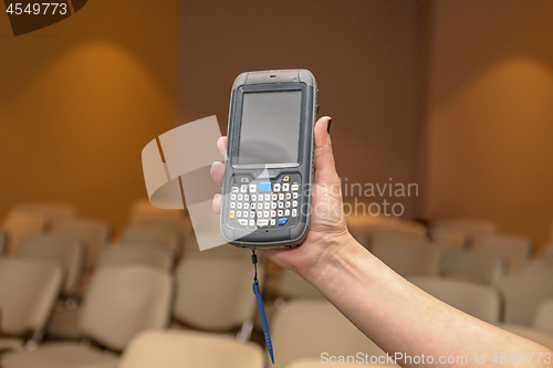 Image of Woman Holding Portable Computer