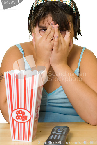 Image of Girl Watching Scary Movie