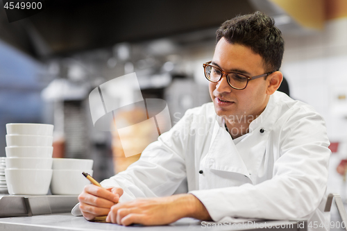 Image of chef at kebab shop or fast food restaurant