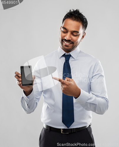 Image of indian businessman with smartphone