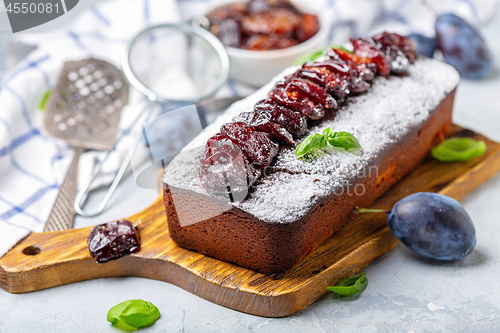 Image of Cake with spiced plums.