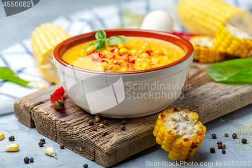 Image of Corn soup with leeks and hot chili peppers.