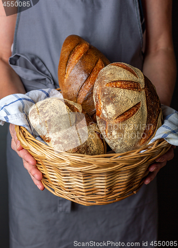 Image of Artisanal freshly baked bread in the basket.