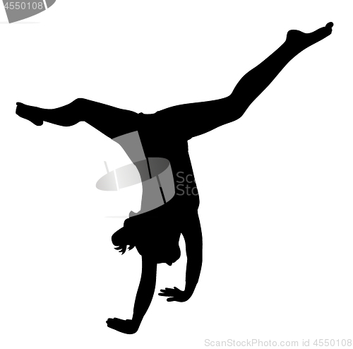 Image of Gymnast girl making handstand