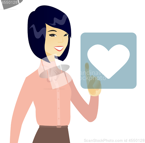 Image of Business woman pressing web button with heart.