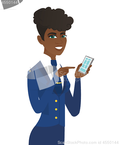 Image of Arican-american stewardess holding a mobile phone.