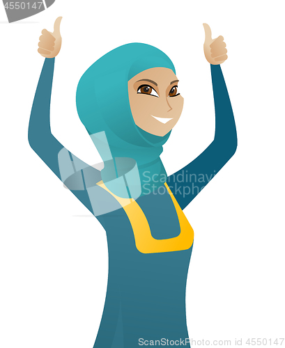 Image of Muslim business woman standing with raised arms up
