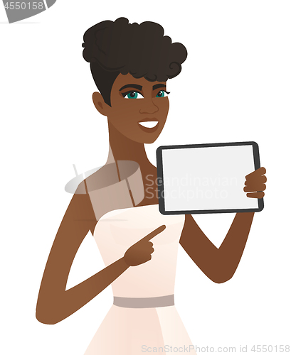Image of Young african fiancee holding tablet computer.