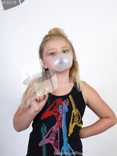 Image of Young Girl Blowing a Bubble